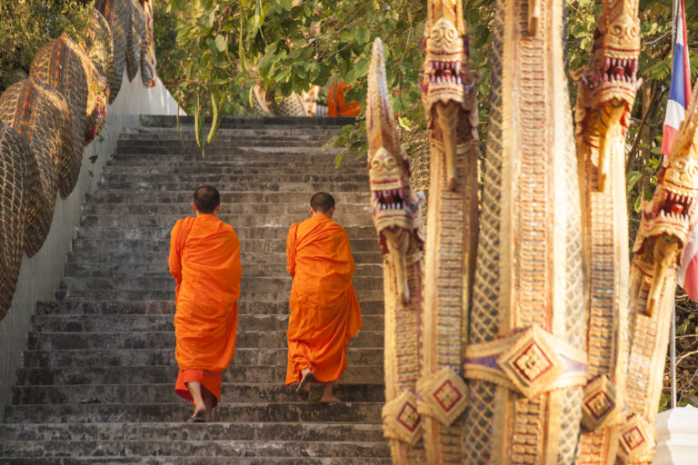 Barefooted buddhist monks in Chiang Mai Thailand