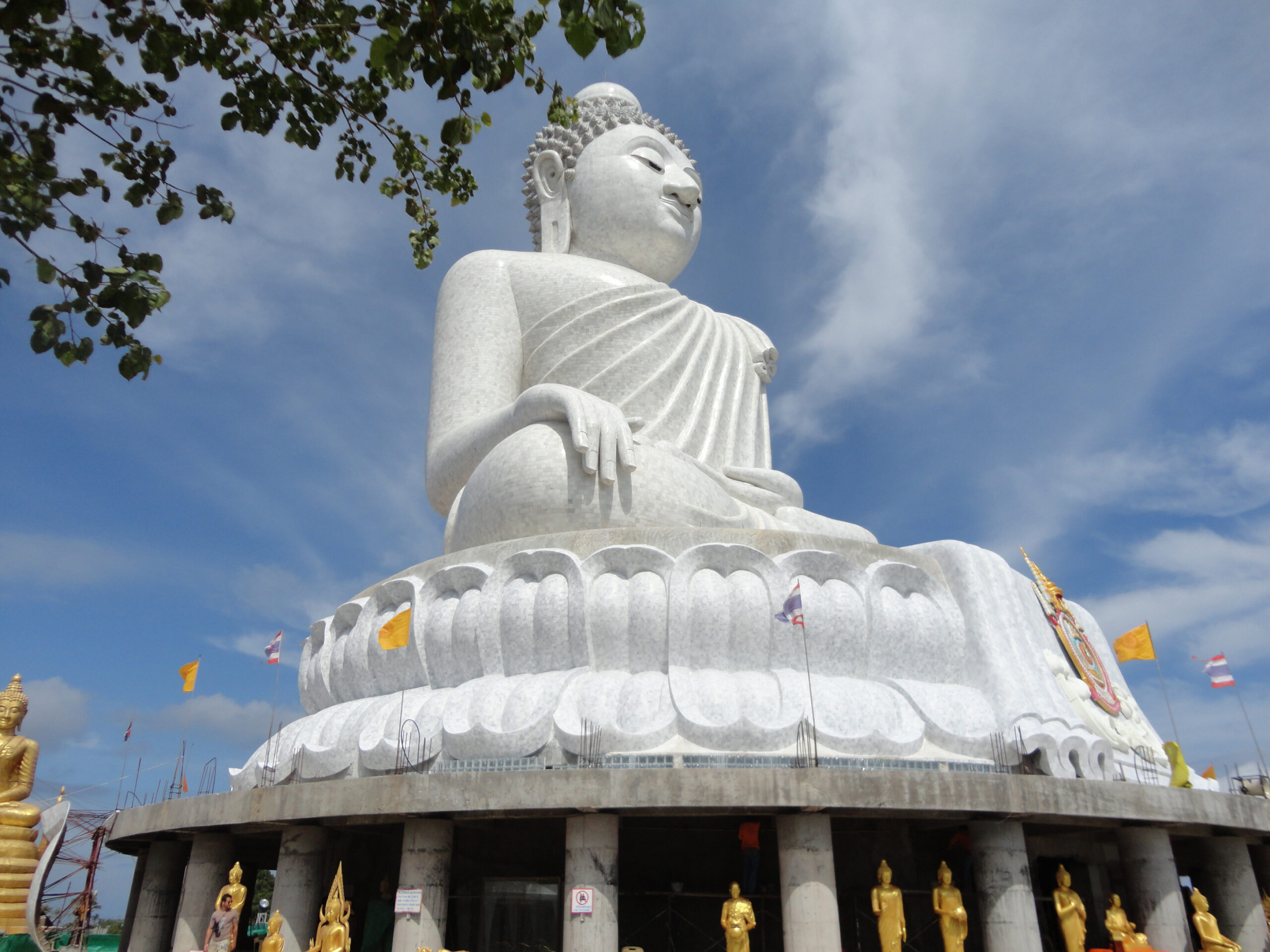 Big white marble Buddha statue on top of the hill - Phuket, Thailand